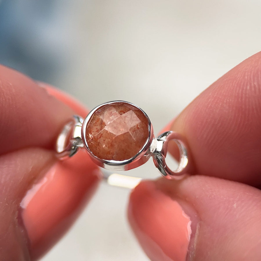 Checker-cut sunstone Trinity ring in sterling silver