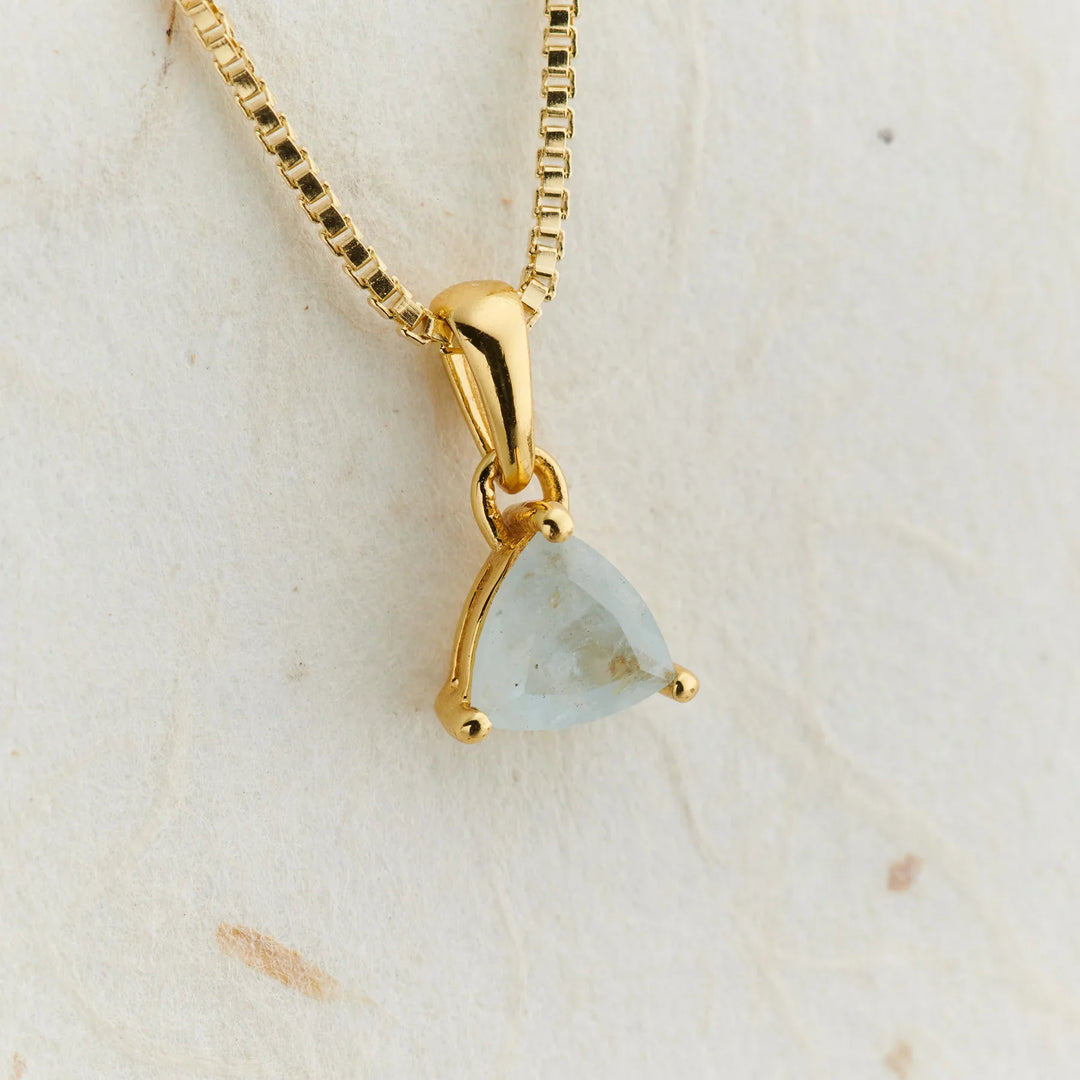 Trillion-cut aquamarine pendant in 18K Everyday Gold on a box chain