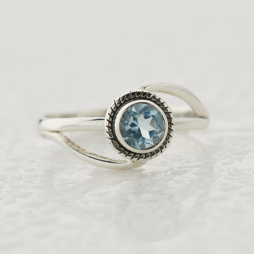 Blue Topaz Sterling Silver Infinity Ring
