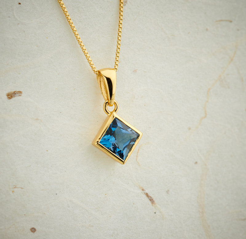 Square-cut london blue topaz pendant in 18K gold over sterling silver