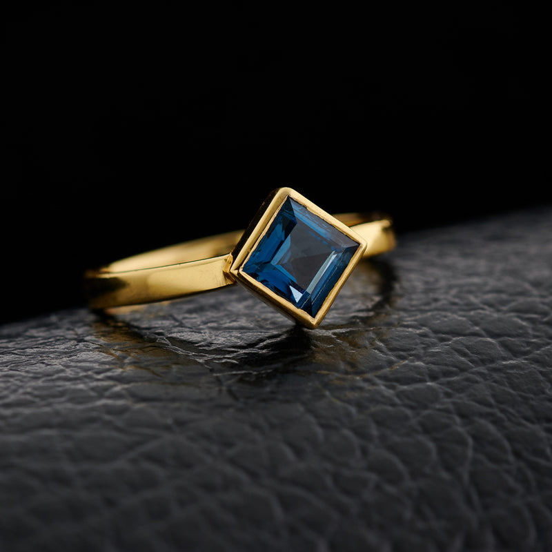 Square-cut london blue topaz ring in 18K gold over sterling silver