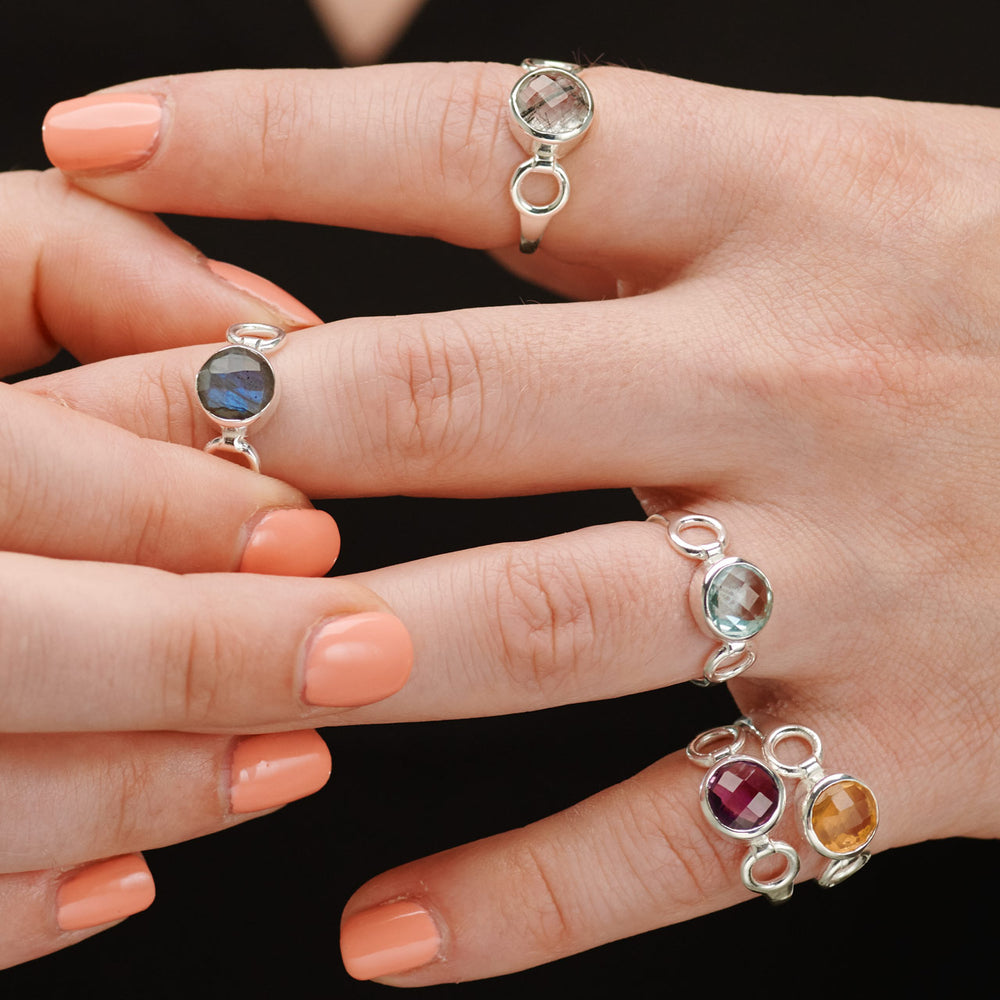 Round-cut golden rutile ring in sterling silver